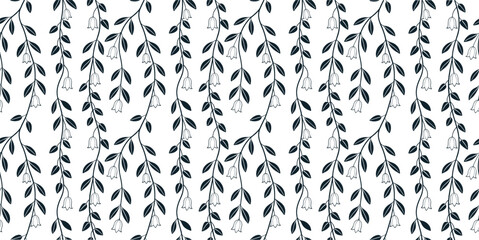 Elegant seamless botanical vine pattern with delicate leafy branches. Minimal monochrome nature wallpaper background. Modern floral repeat textile print for fabric decor and packaging. © Khadiza