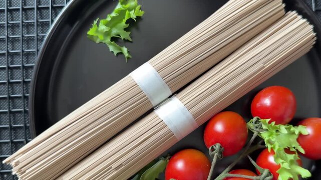 Buckwheat noodles soba raw pasta food preparation lunch or dinner tasty organic snack fresh gourmet food background on the table rustic food close-up copy space 