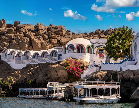 Colorful Nubian traditional houses on the bank of the Nile. Aswan Egypt