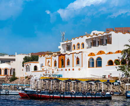 Colorful Nubian traditional house on the bank of the Nile. Aswan Egypt