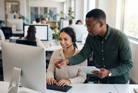 Young professionals collaborating in modern call center office