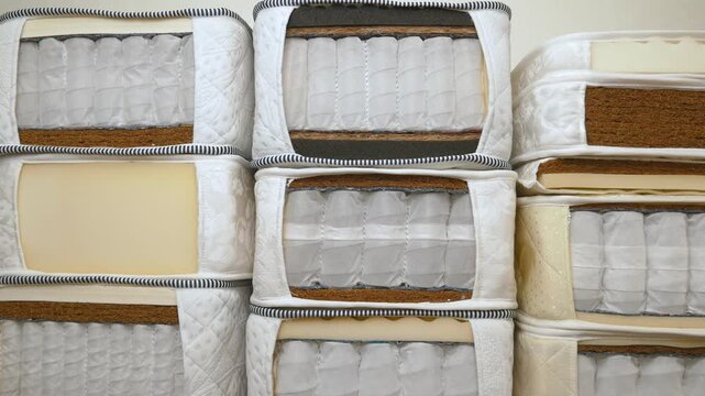Cross-sections of various mattress samples. Different types of materials found in the mattress core