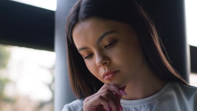 Close up portrait Caucasian pensive girl student ponder thinking teen solution woman thoughtful think hesitate unsure female lady pondering study education difficulty decision puzzled in school campus