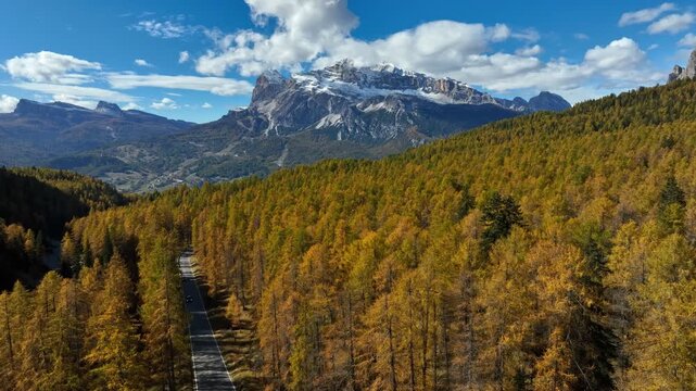 Alpine Road Traffic Autumn Drone Flyover