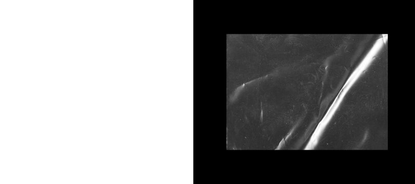 Vintage film texture with light leak and dust, grainy analog overlay for cinematic effects, retro black and white photographic background