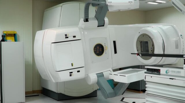 Close-up of a medical linear accelerator in therapeutic oncology.