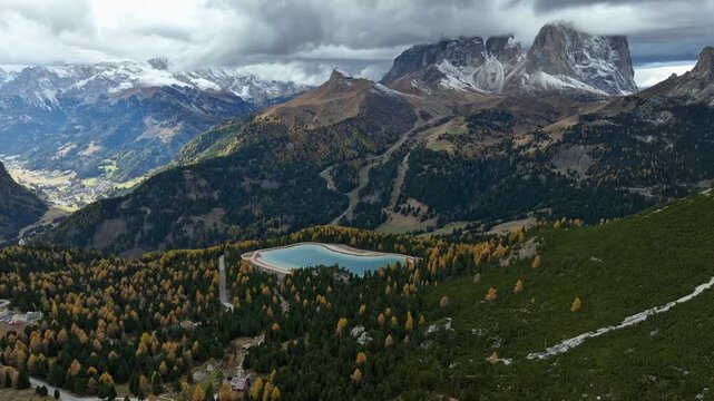Passo Pordoi Alpine Lake and Snowy Peaks Orbit