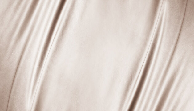 Light brown beige textile fabric. Elegant luxury background. Soft folds, curved lines. Nude pastel. Beauty branding fashion wedding. Premium cosmetic design. Empty template. Flat lay, table top view.