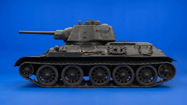 A detailed model of the legendary T-34 medium tank is isolated against a blue background, showcasing its historical armor design and turret. This asset is ideal for projects related to military histor