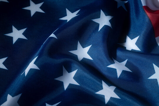 American flag stars texture with blue patriotic fabric folds