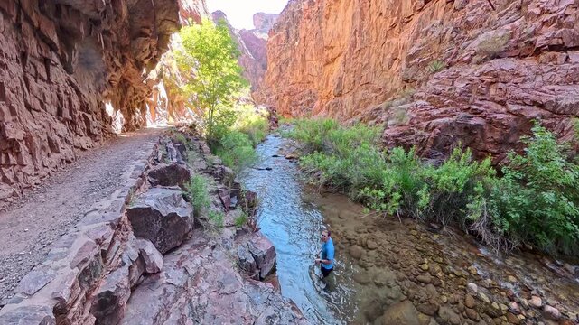 Man Dunks in the Creek running along North Kaibab Trail