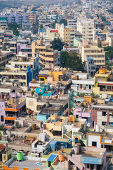 Fototapeta premium India urban cityscape showing dense colorful residential buildings in Vijayawada, Andhra pradesh.
