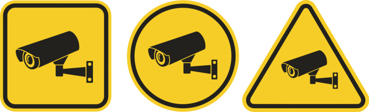 Security Camera Icons In Yellow Warning Shapes vector