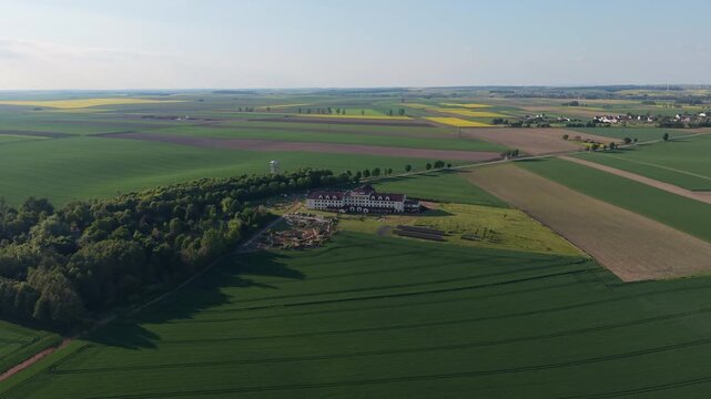 Aerial drone view of observation tower in Pietrowice Wielkie surrounded by farmland