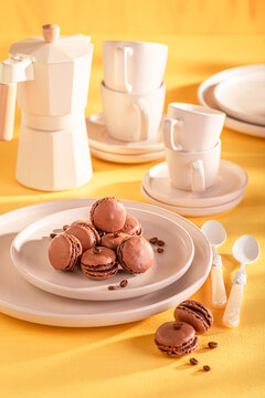 Creamy and homemade coffee macarons made of chocolate and sugar.
