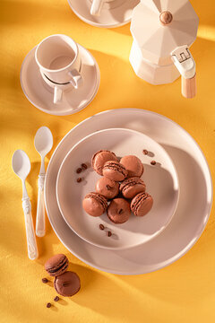 Homemade coffee macarons with aroma of coffee and chocolate.