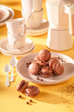 Creamy and homemade coffee macarons made of meringue and chocolate.