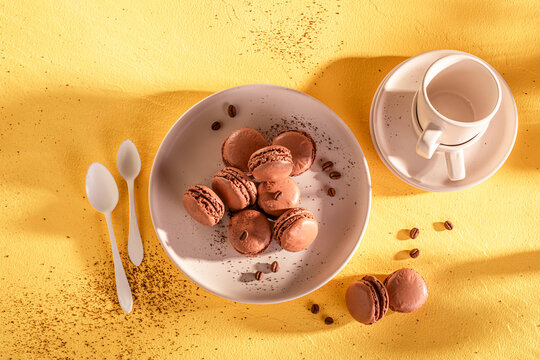 Tasty and fresh coffee macarons made of meringue and chocolate.