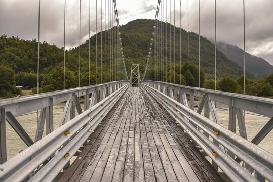 Suspension bridge over Rio Exploradores near Puerto R&iacute;o Tranquilo, Valle Exploradores, Parque Nacional Laguna San Rafael, Patagonia, Chile