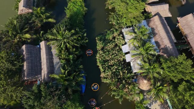 Narrow Canal Alleys With Palm Trees And Houses, Dense Vegetation Forms Green Corridors Between Water Lanes, Intimate Village Waterways With Small Boats And Shaded Thatch Roofs