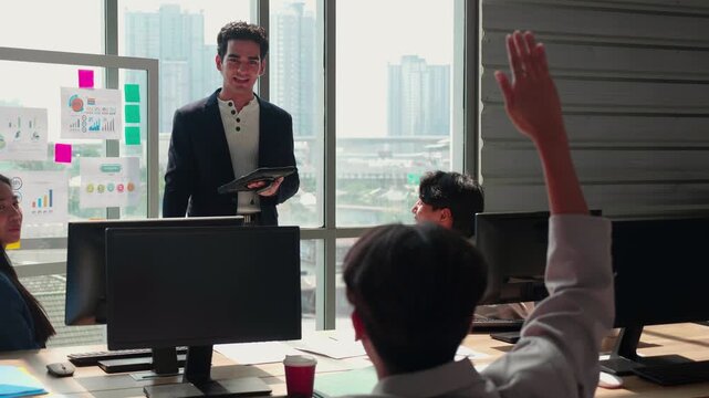Employee raising hand asking question presentation in office, manager holding tablet listening to team member, corporate workspace with glass board chart, teamwork strategy planning and brainstorming.