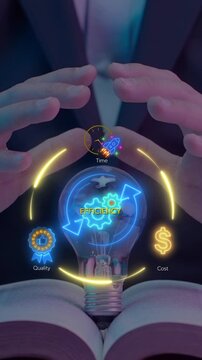 Business efficiency concept, how much a company or organization can produce as it relates to time, cost and quality. Businessman shows glowing neon line of efficiency icon inside lightbulb.