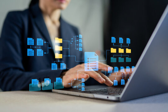 Businesswoman Using Laptop with Document Management System DMS Directory Structure Icon