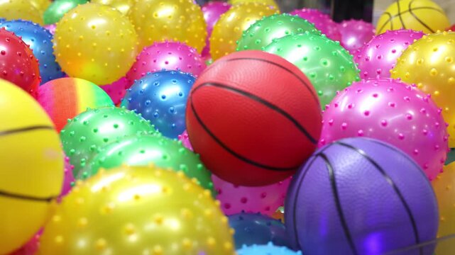 Colorful Balls Inside Of An Arcade Game