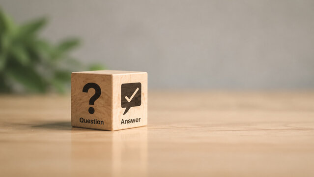 AI generated wooden cube question answer symbols representing decision making problem solving choice clarity solution concept clean minimal background