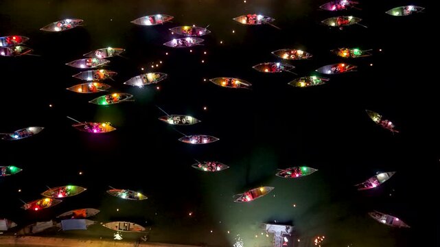 Panorama aerial drone view of Hoi An ancient town with boat tour and beautiful lanterns in night. UNESCO world heritage. One of the most travel popular touristic destinations