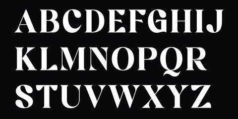 Full set of elegant serif alphabet letters on black background, clean white font, modern and classic typography. © SaHeD