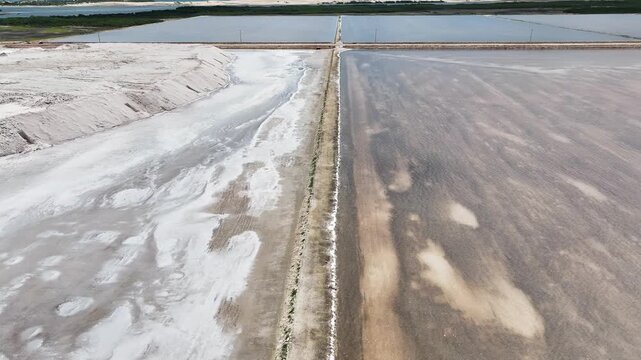 Drone view of evaporation tanks at a sea salt extraction site. Salinas, a salt factory in northeastern Brazil.