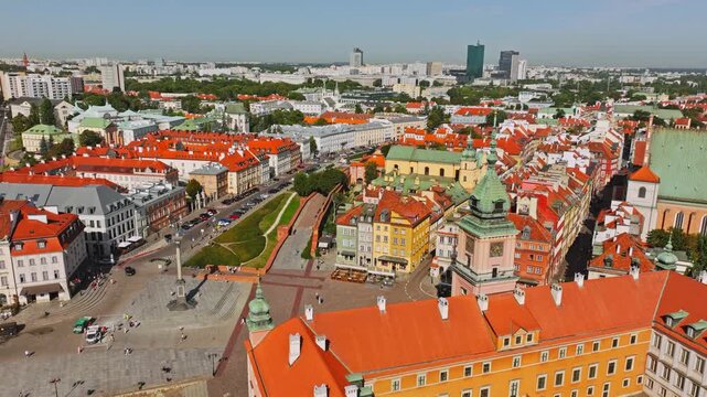 Cinematic aerial shot over Plac Zamkowy Warsaw Poland in sunny daylight