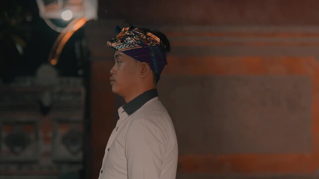 Rack Focus from Statue to Balinese Man Profile
