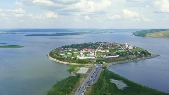 Sviyazhsk, Russia. The historic island-city of Sviyazhsk, its white-walled monasteries and golden-domed churches rising above the confluence of the Volga and Sviyaga Rivers. Drone footage