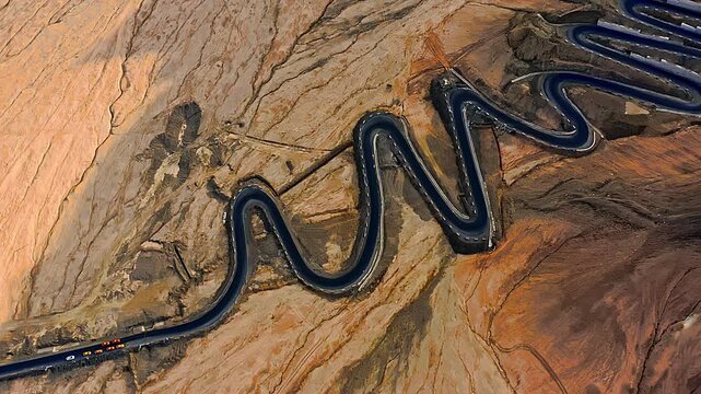 Aerial view of the winding road of the Panlong Ancient Road in Vacha township, Tashkurgan Pamir Plateau, Kashgar region, Xinjiang, China