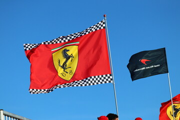 Obraz premium 22 May 2026, Montreal, Canada: Ferrari flags wave above Formula 1 fans at Grand Prix weekend. g.