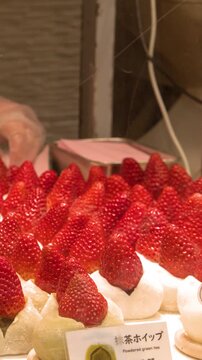 Chef Preparing Fresh Strawberry Mochi Daifuku at Tsukiji Market in Tokyo