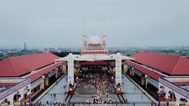 aerial view of the largest grand mosque in Central Java in the morning while people celebrate ied al fit