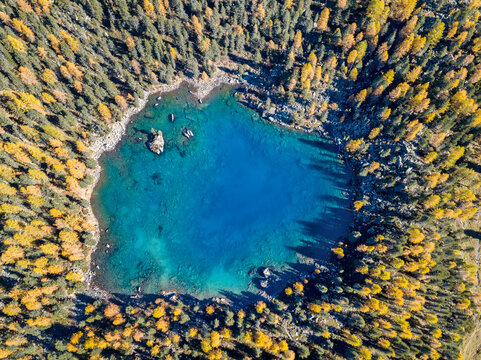 Aerial view of Saoseo lake - a heart-shaped pond in Grison Switzerland