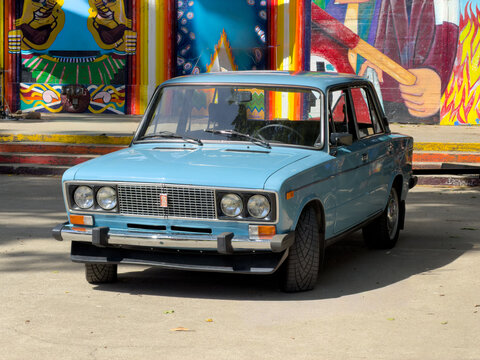 1983 Russian Lada Parked In Front Of Mural