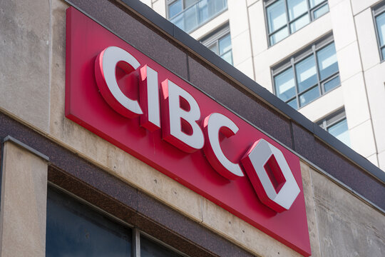 Toronto, Canada - April 17, 2026: Dynamic commercial zone illustrating vivid banking logos set against towering urban