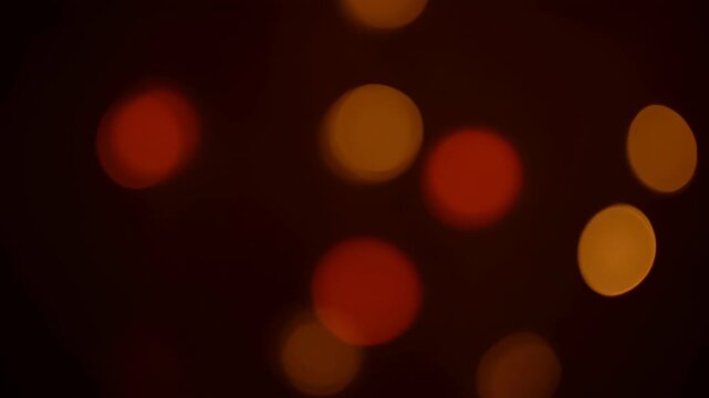 Orange light fire smoke texture abstract bokeh glow dark background with warm blur and soft smoke texture, orange fire light texture smoke abstract bokeh glow background and orange fire light texture