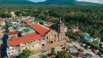 Aerial View of Liliw Church Plaza with Red Rooftops, Saint John the Baptist Parish, Red Brick Architecture and Provincial Townscape, Heritage Laguna Philippines © Gids Stories
