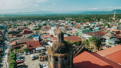 Aerial view of the historic Liliw Church bell tower and rural town landscape in Liliw Laguna, Philippines © Gids Stories