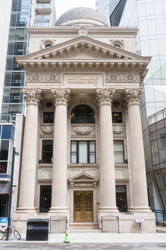 Toronto, Canada - April 17, 2026: Impressive heritage architecture showcasing towering stone pilasters and ornate gold