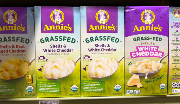 Annie's Grass Fed White Cheddar Macaroni Boxes on Grocery Shelf