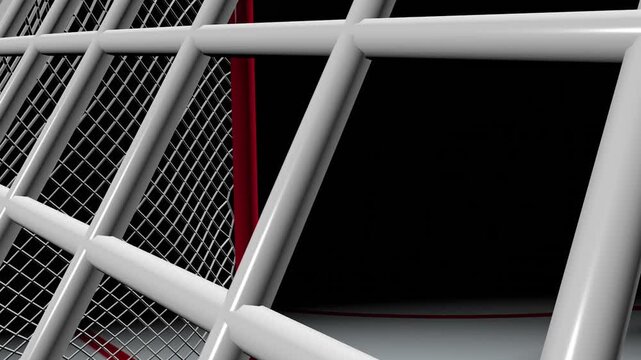 The camera pans around the hockey goal on the hockey field.