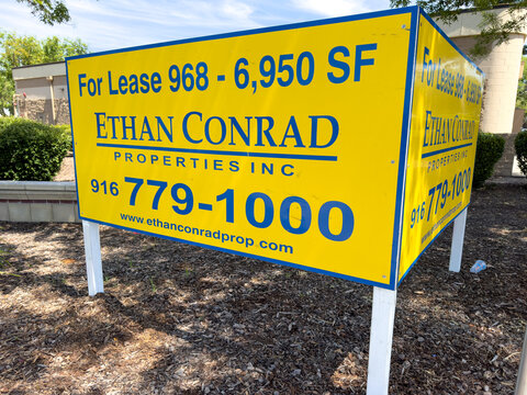 Commercial Real Estate For Lease Sign for Ethan Conrad Properties in Woodland California