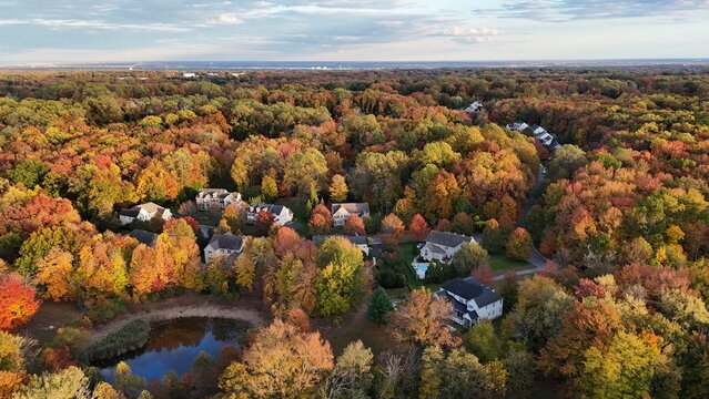 Aerial view of colorful autumn neighborhood in Garnet Valley, Pennsylvania suburb near Philadelphia